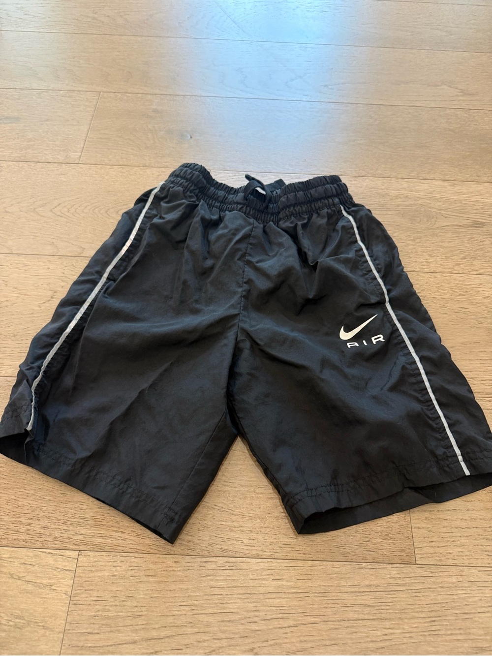 Nike Black Athletic Shorts with White Swoosh Tag